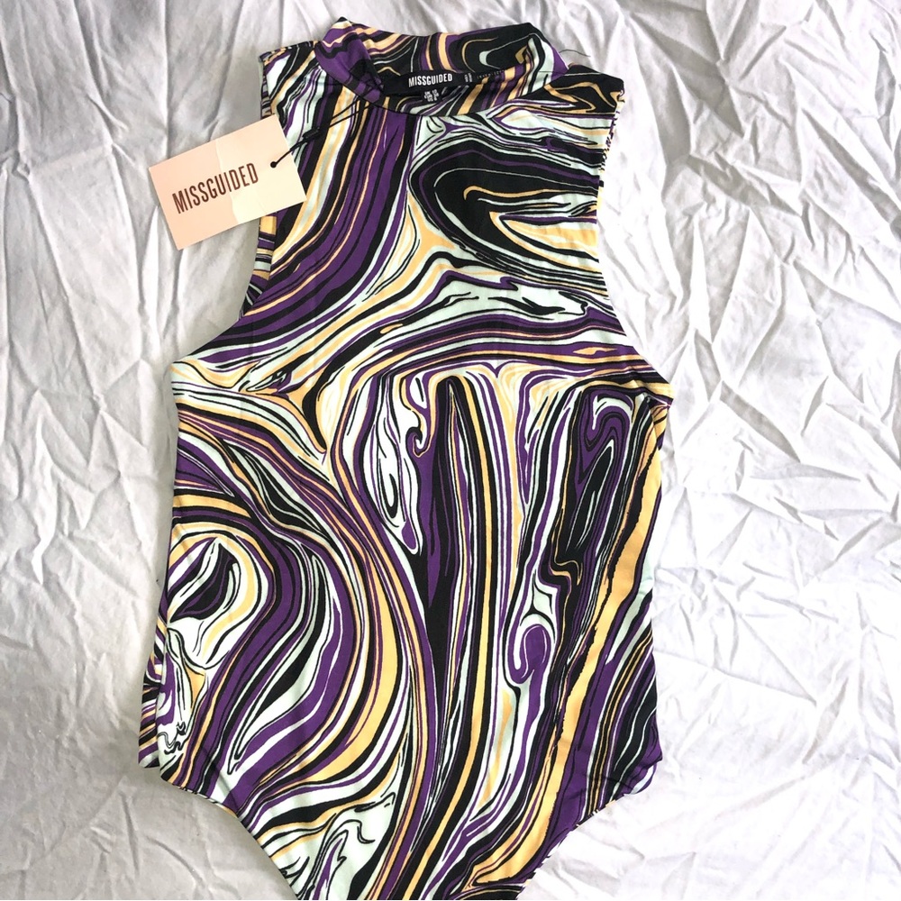 Missguided bodysuit runs small possibly extra small. Never worn. Tags attached.